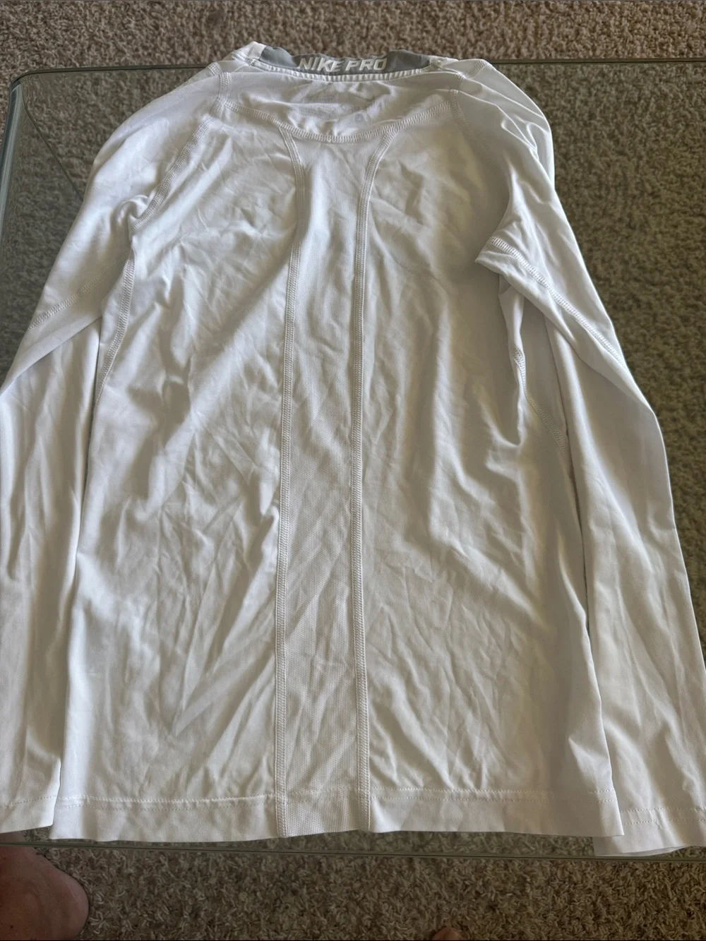 Nike White Long Sleeve Dri-FIT Top with Black Swoosh